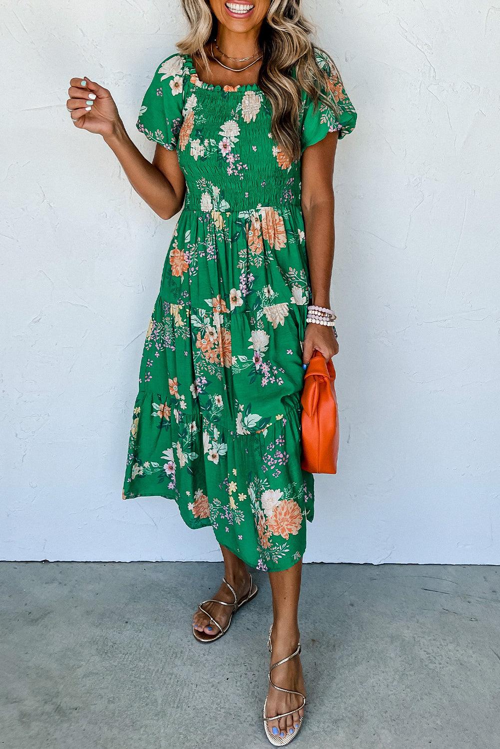 Robe mi-longue volants et manches bouffantes