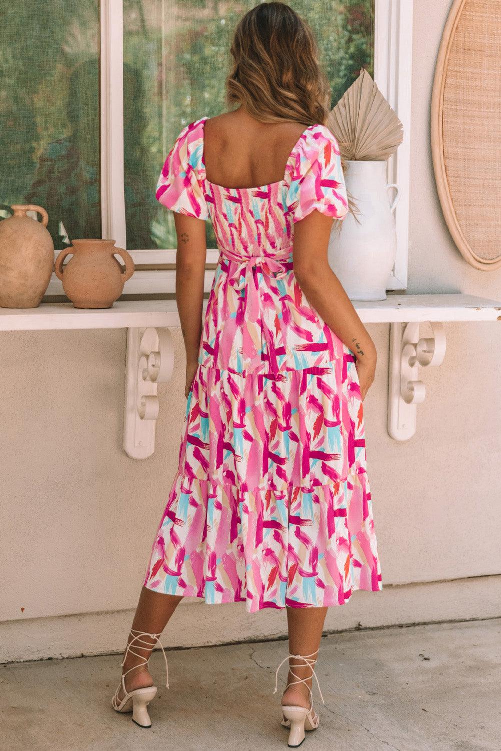 Robe mi-longue smockée à volants et imprimé pinceau